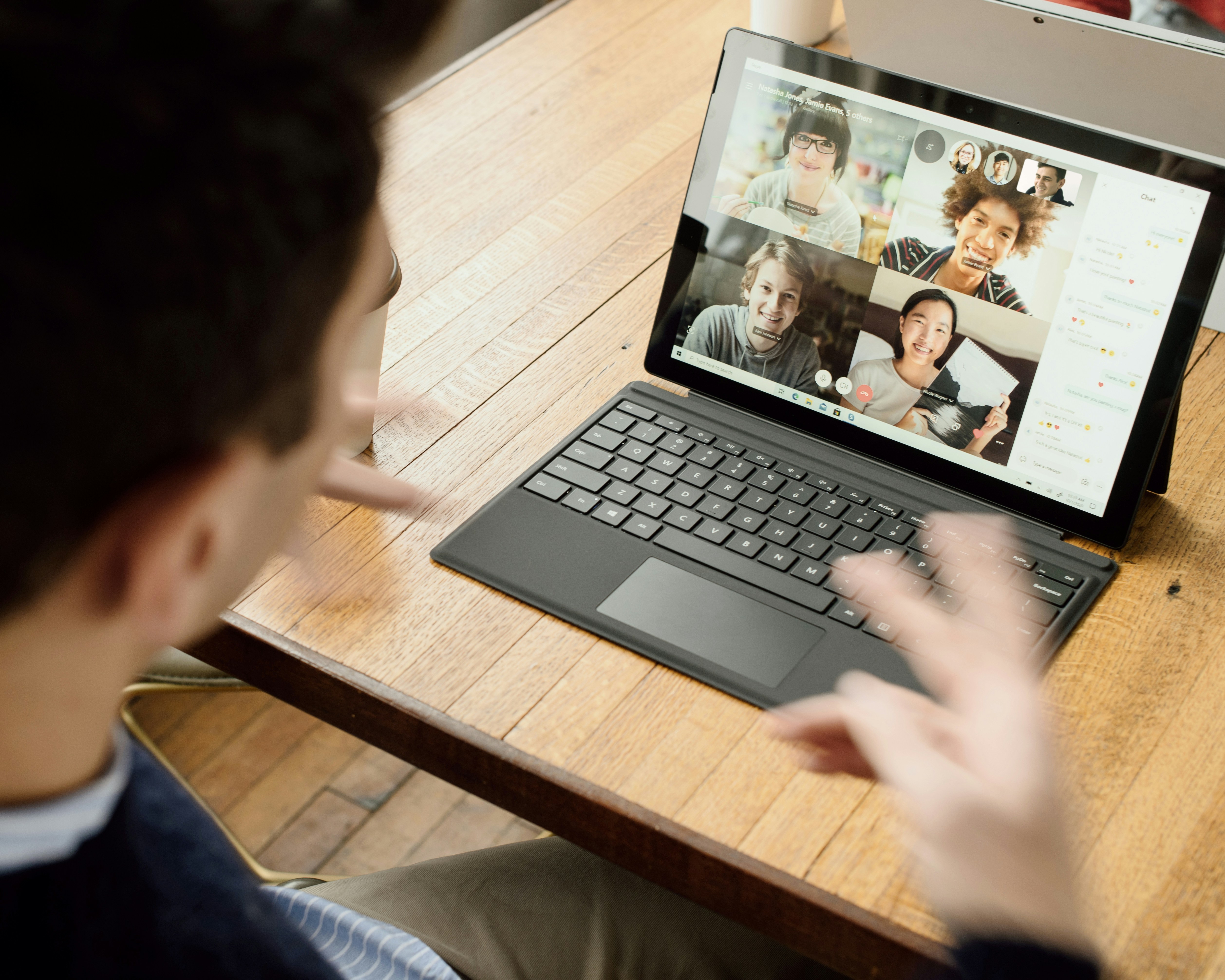 Remote marketer in a virtual meeting using AI tools and AI agents to enhance team collaboration and streamline marketing workflows.