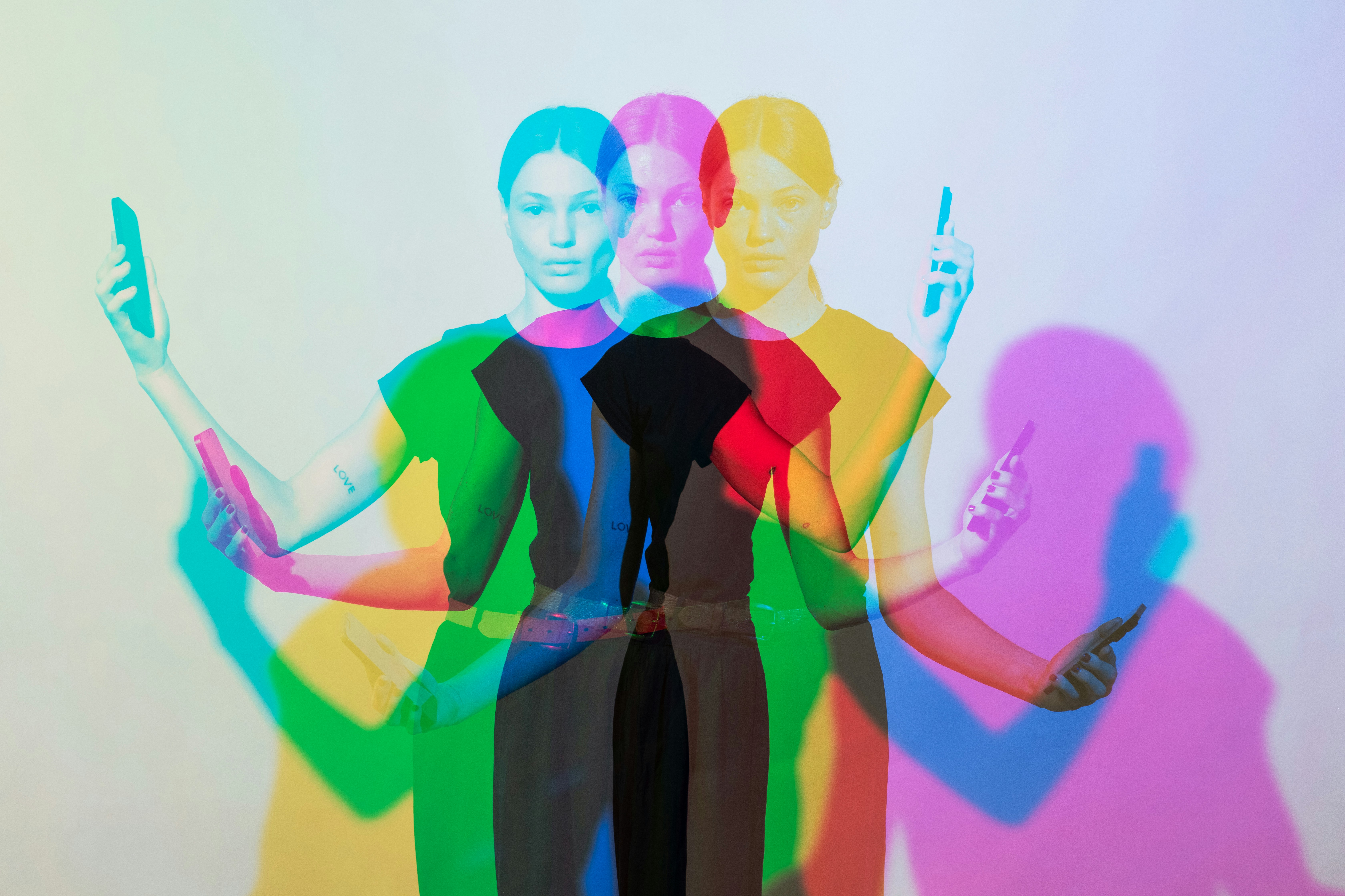 A digitally manipulated image of a woman using a smartphone, with overlapping colorful silhouettes representing AI agents managing multiple tasks simultaneously.